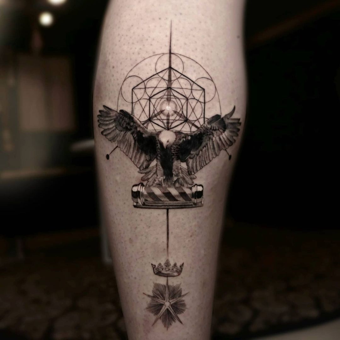 Intricate tattoo design featuring an eagle and geometric patterns